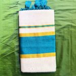 Kerala Kasavu saree with Peacock blue border and tussels