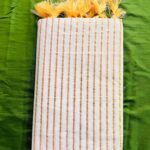 Kerala soft cotton saree with golden stripes and tussels
