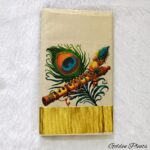 Kerala Kasavu saree - mural print of Lord Krishna's flute and a peacock feather